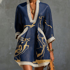Navy midi lace-trim dress with gold pattern, V neckline, three-quarter sleeves