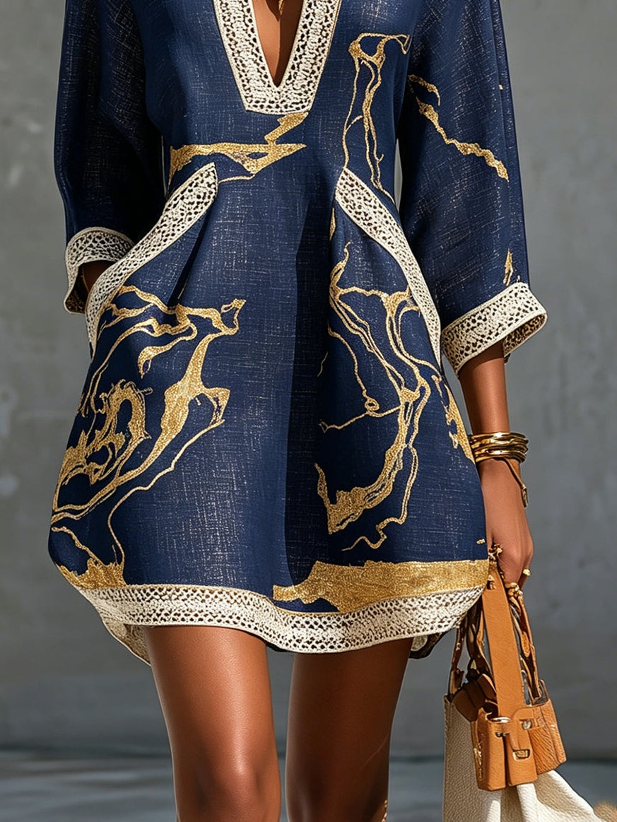 Navy midi dress with gold motif and scalloped lace trim hem; side front view
