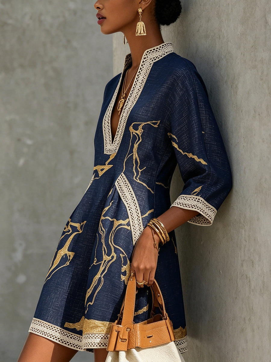 Navy midi lace-trim V-neck dress with gold motif; side view, three-quarter sleeves