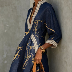 Navy lace midi dress with white lace trim and gold abstract pattern