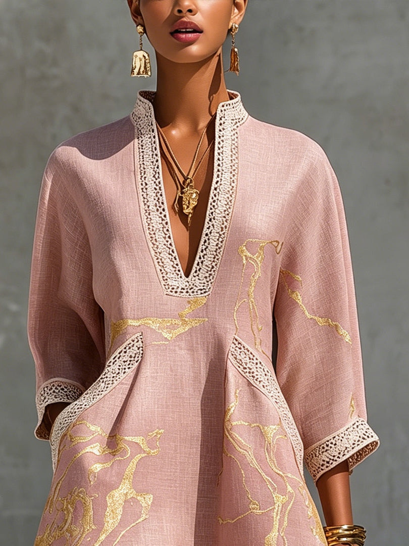Pink lace-trim midi dress close-up with deep V neckline, gold motifs, quarter sleeves