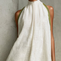 White halter midi dress with high neckline and green side trim