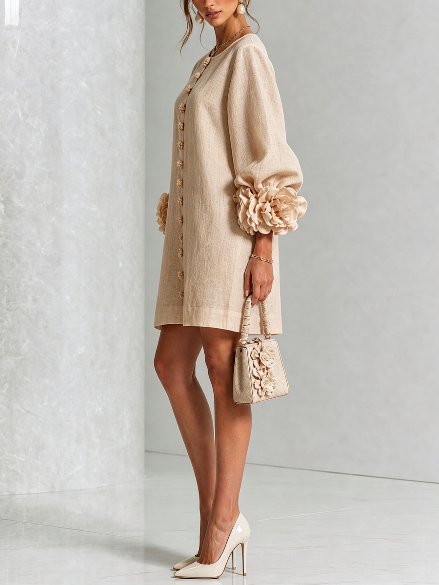 Beige button-front midi dress with long sleeves and rosette cuffs, side view