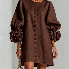 Dark brown button-front midi dress with vertical embroidered buttons and flower cuff details