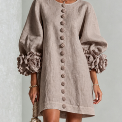Taupe button-front midi dress with round neckline and rosette puff sleeves