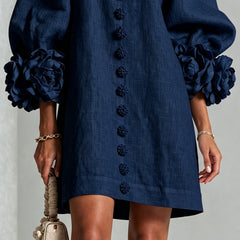 Navy embroidered midi dress hem and puff sleeve cuff with rose rosette detail