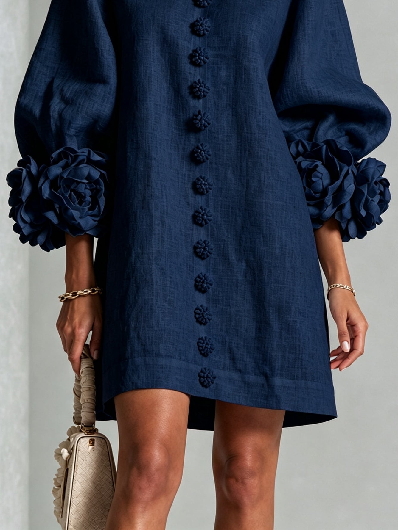 Navy embroidered midi dress hem and puff sleeve cuff with rose rosette detail