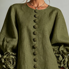 Olive green button-front midi dress with long sleeves and floral-detail buttons