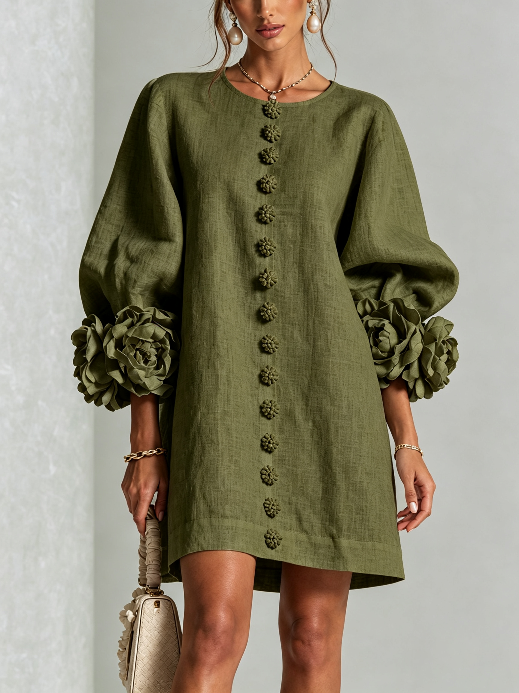 Olive green button-front midi dress with round neckline and puff sleeves with rosette cuffs