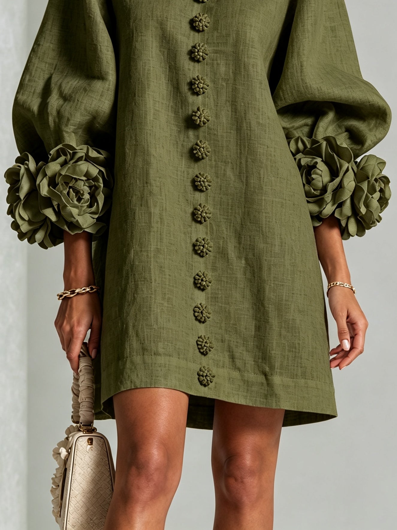 Olive green button-front midi dress with floral rosette trim and puff sleeves