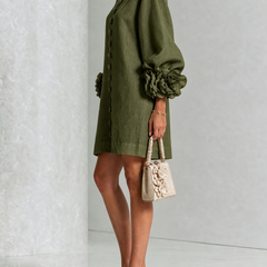 Olive green button-front midi dress, side view, round neck and rosette puff sleeves
