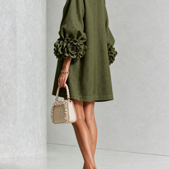 Olive green button-front midi dress with rosette cuff sleeves and gold button placket
