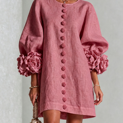 Mauve pink button-front midi dress with round neck and rosette puff sleeves