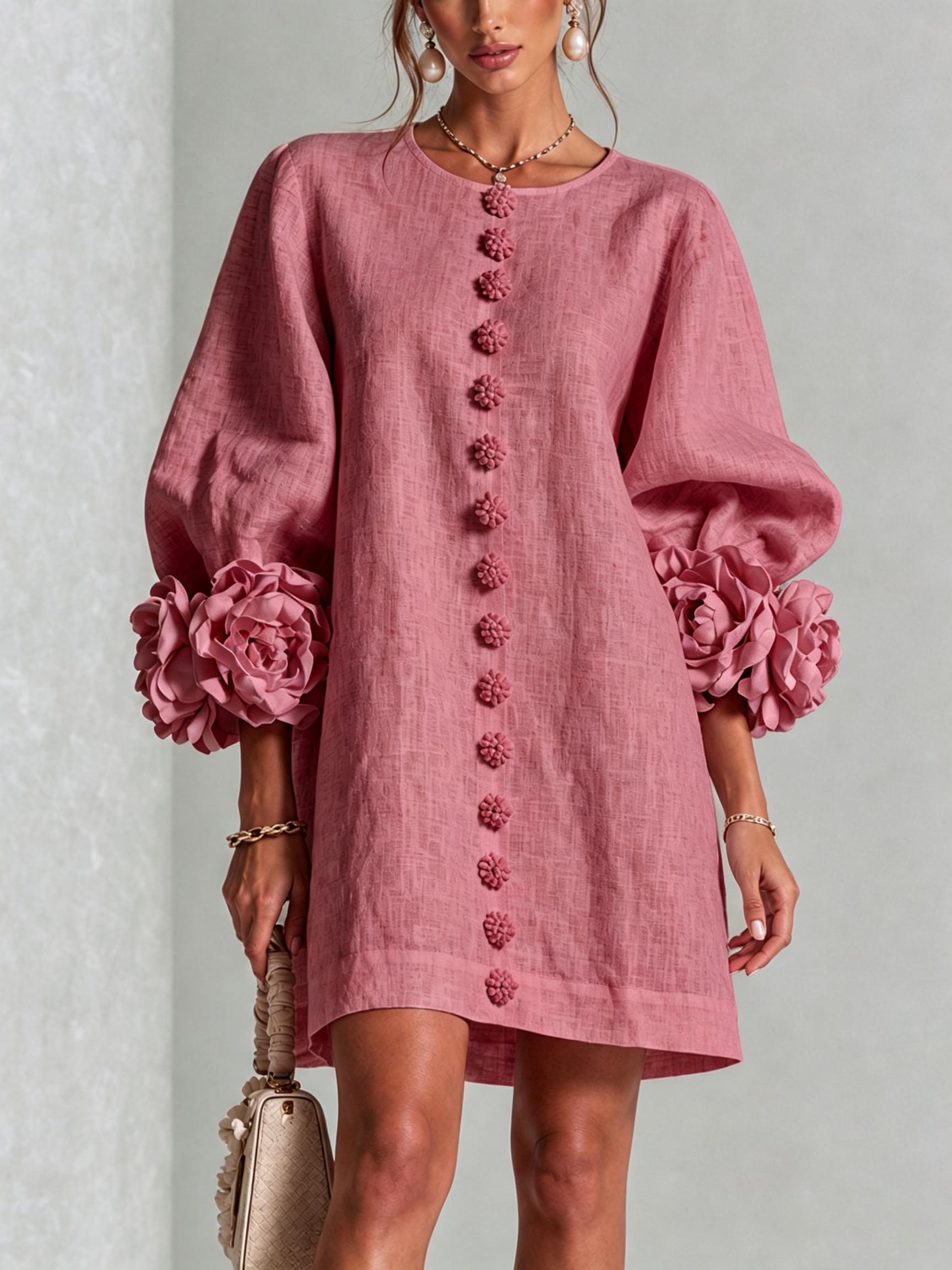 Mauve pink button-front midi dress with round neck and rosette puff sleeves