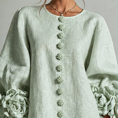 Sage green midi dress front view with round neck and vertical floral embroidery