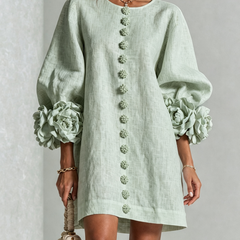 Sage green linen midi dress with round neck, vertical floral embroidery, puff sleeves