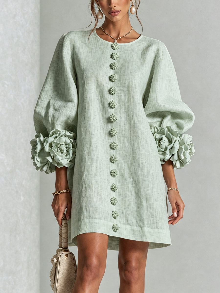 Sage green linen midi dress with round neck, vertical floral embroidery, puff sleeves