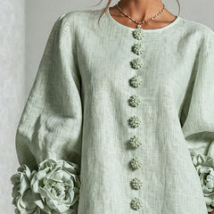Sage green midi dress with round neck, long puff sleeves, vertical floral embroidery