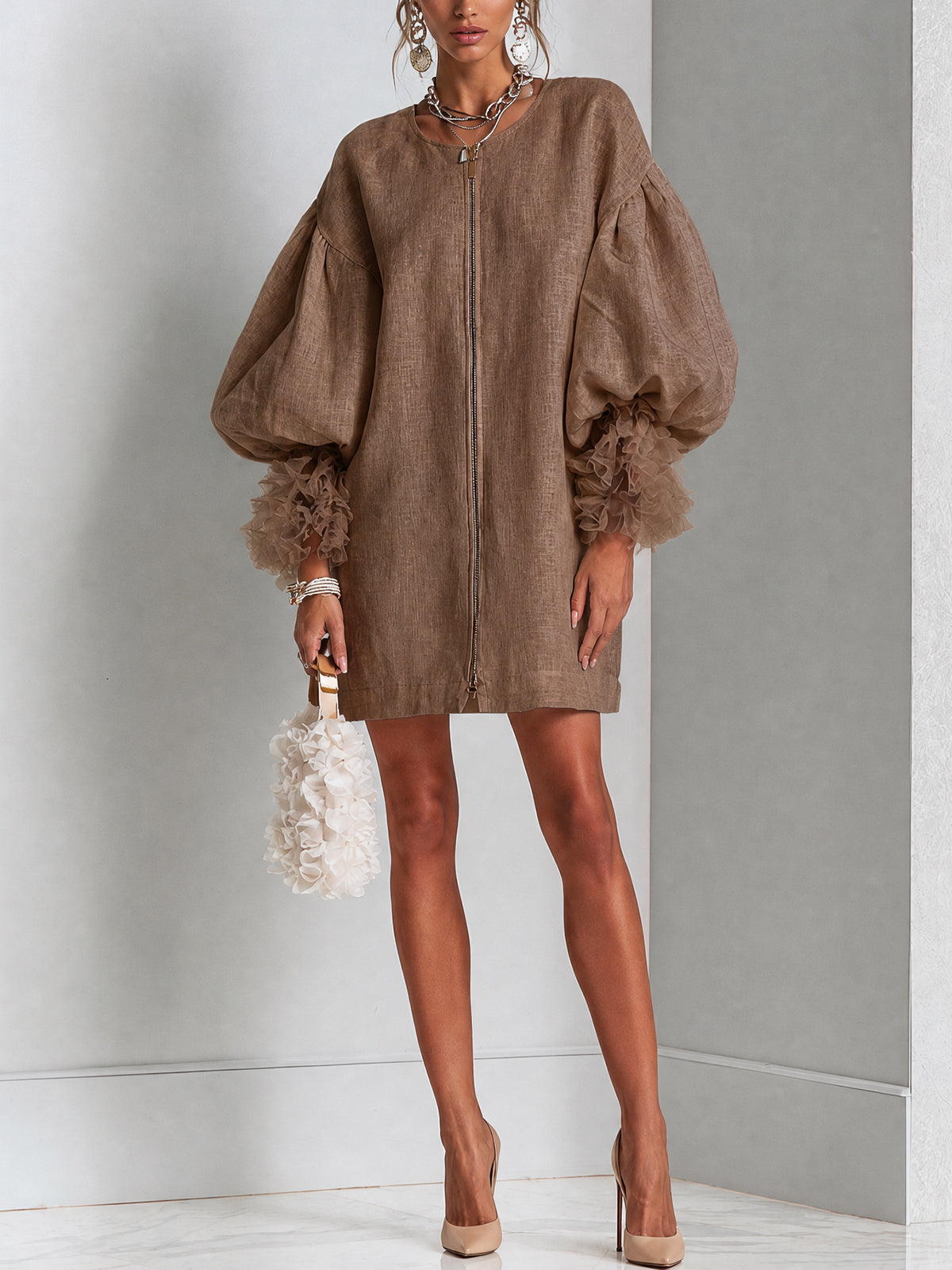 Brown zip-front midi dress with balloon sleeves and ruffled cuff trim, straight midi hem.