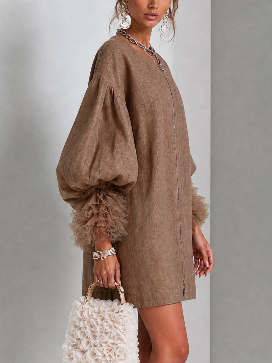 Brown zip-front midi dress with oversized balloon sleeves and layered ruffle cuff detail.