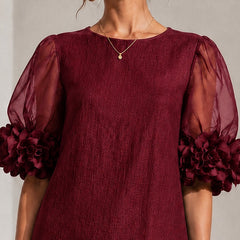 Burgundy shift dress with sheer puff sleeves and ruched round neckline