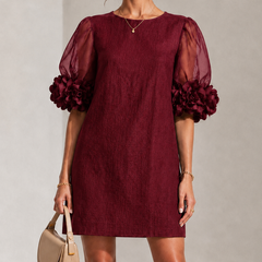 Burgundy puff-sleeve midi dress with sheer sleeves and ruched round neckline