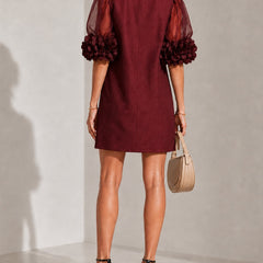 Burgundy mini dress with sheer puff sleeves and gathered back yoke seam
