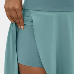 Mint blue skirt close-up showing side wrap detail and angled front slit
