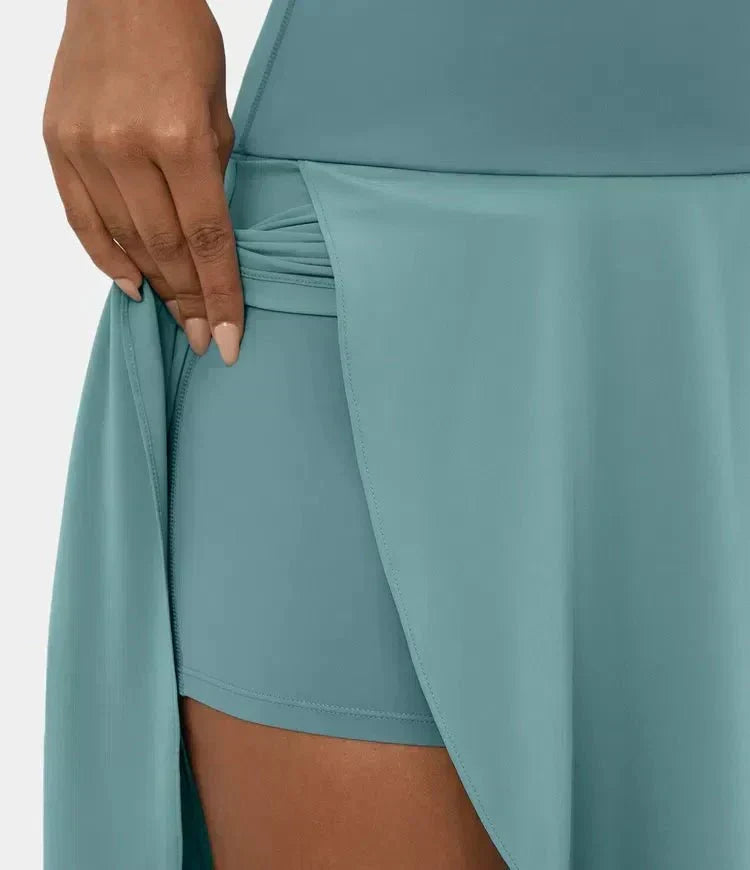 Mint blue skirt close-up showing side wrap detail and angled front slit