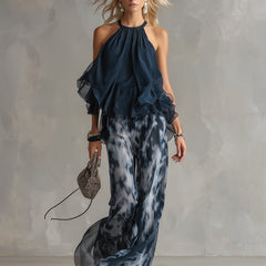 Two-piece halter ruffle top with wide-leg tie-dye printed pants, navy and slate