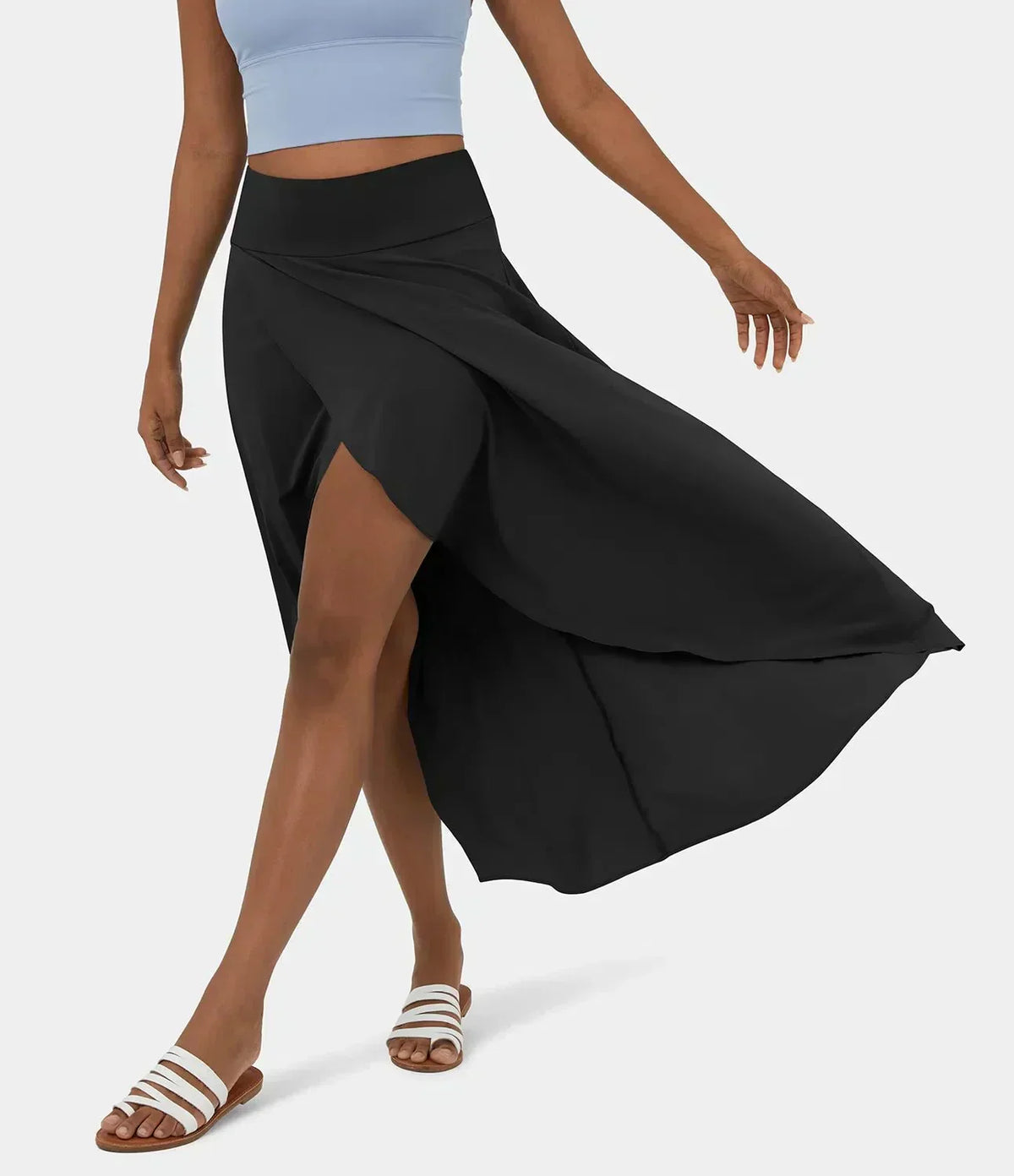 Black midi skirt with draped front slit and layered asymmetric hem