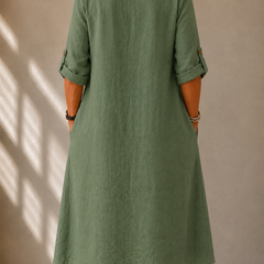 Green relaxed midi dress with back yoke seam and three-quarter sleeves