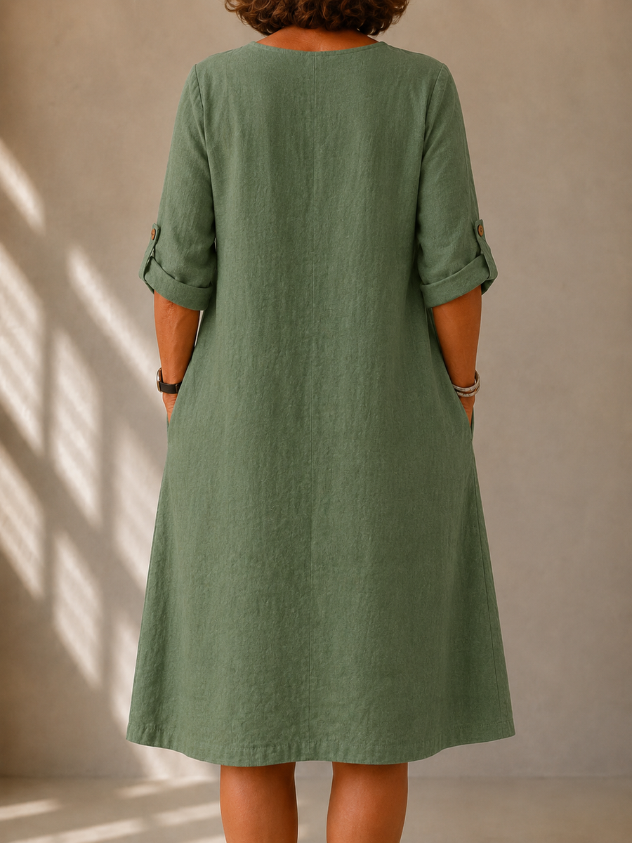Green relaxed midi dress with back yoke seam and three-quarter sleeves