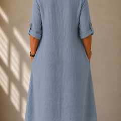 Light blue midi dress with scoop back and 3/4 sleeves, relaxed loose fit