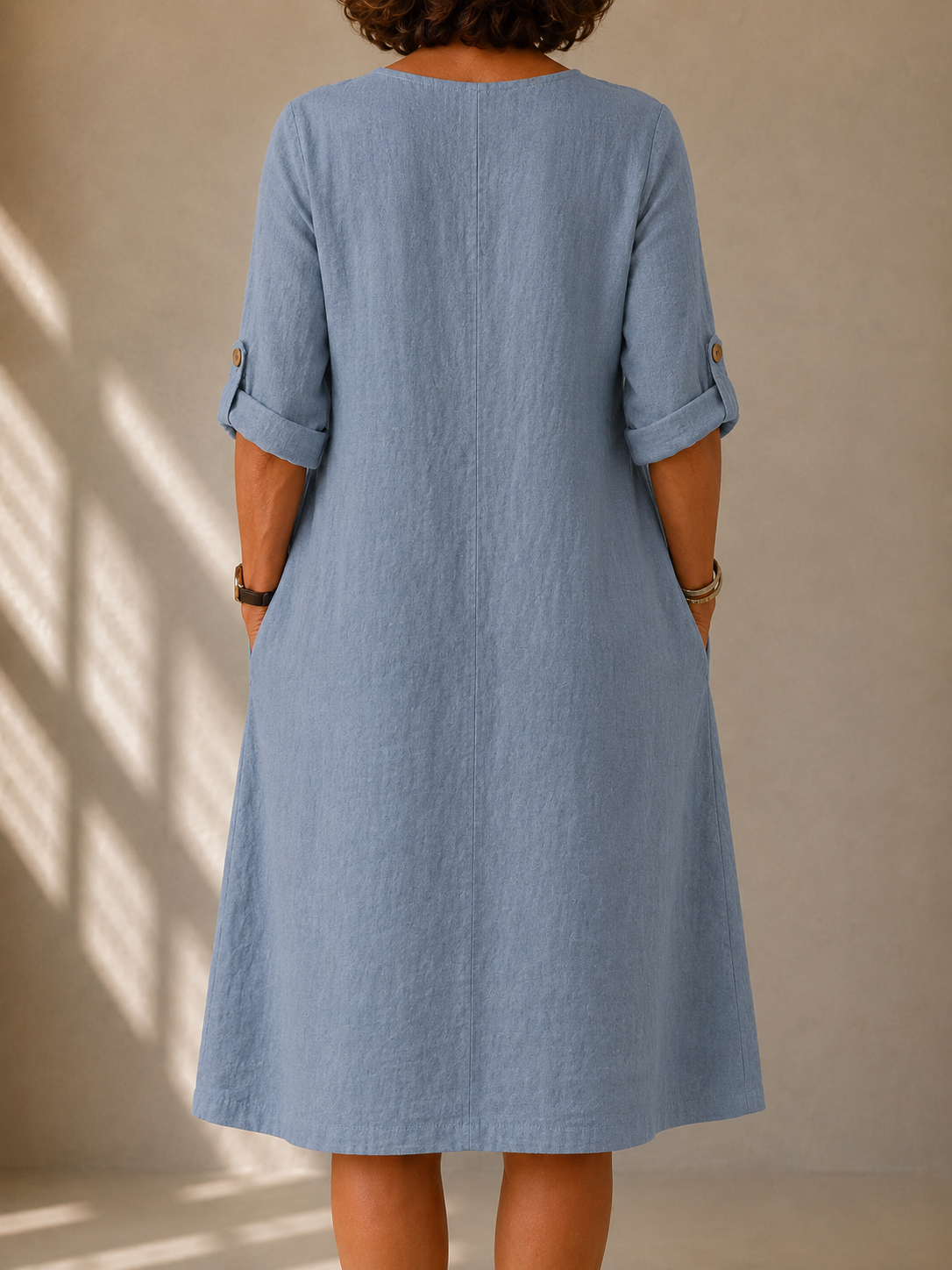 Light blue midi dress with scoop back and 3/4 sleeves, relaxed loose fit