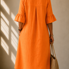 Orange midi dress with back pleat detail and short ruffled sleeves