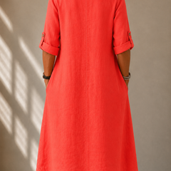 Relaxed V-neck midi dress back view, coral red, three-quarter sleeves