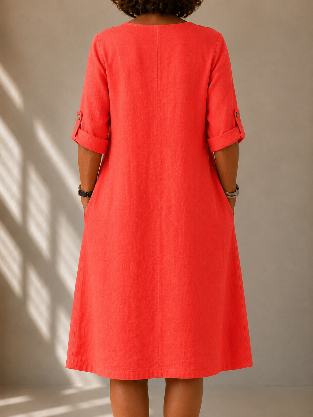 Relaxed V-neck midi dress back view, coral red, three-quarter sleeves