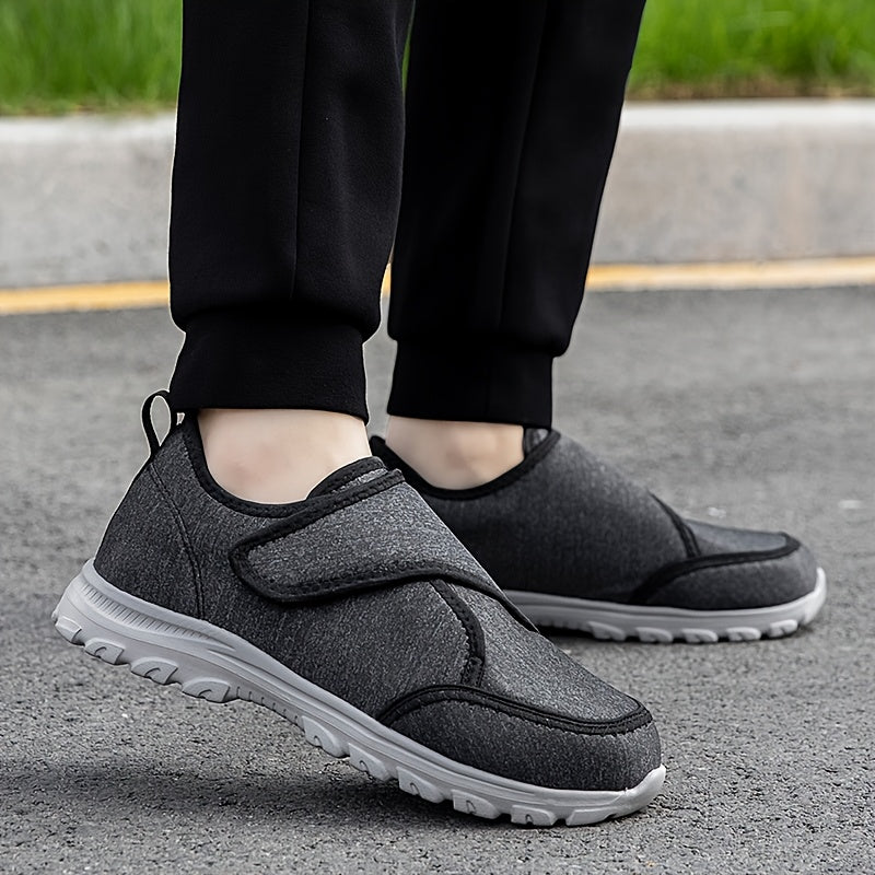 Scarpe ortopediche scure in tessuto con cinturino a velcro e suola bianca, doppia vista