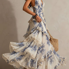 Blue and white floral halter ruffle maxi dress with flowing tiered skirt and V neckline
