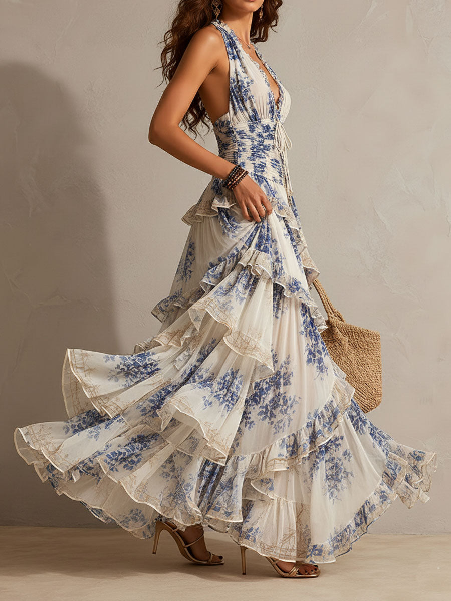 Blue and white floral halter ruffle maxi dress with flowing tiered skirt and V neckline