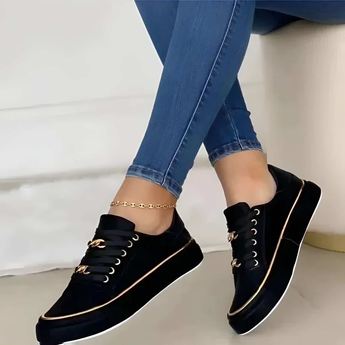 Women’s orthopaedic trainers, black with gold piping and lace-up front detail