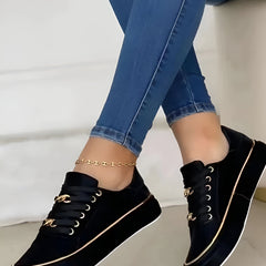 Women’s orthopaedic trainers, black with gold trim and lace-up eyelet details