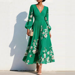 Vestito midi verde con scollo a V, maniche a sbuffo e stampa floreale
