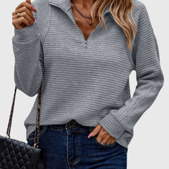 Women’s light grey ribbed knit quarter-zip jumper with long sleeves and pullover style.