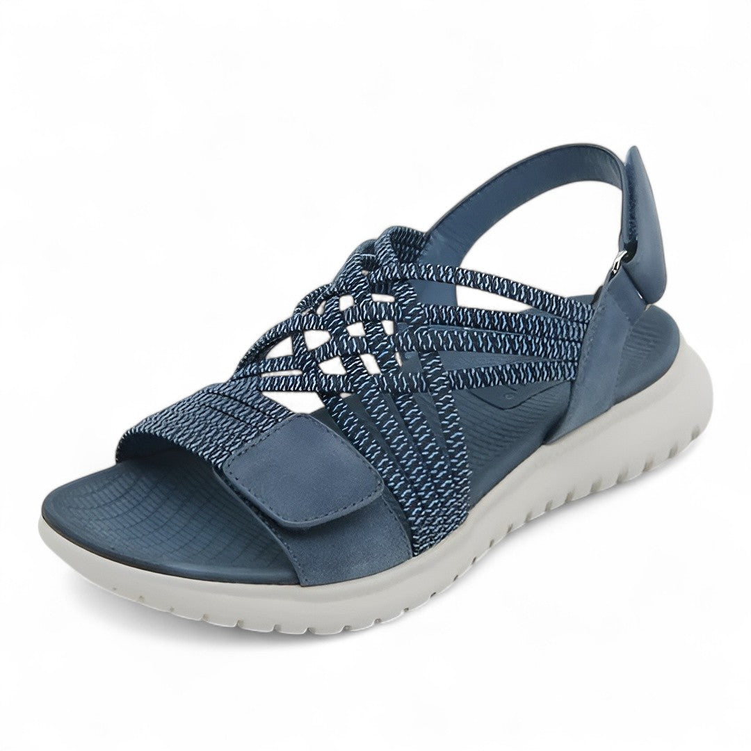 Sandali ortopedici blu con fascia intrecciata e cinturino con velcro, suola bianca.