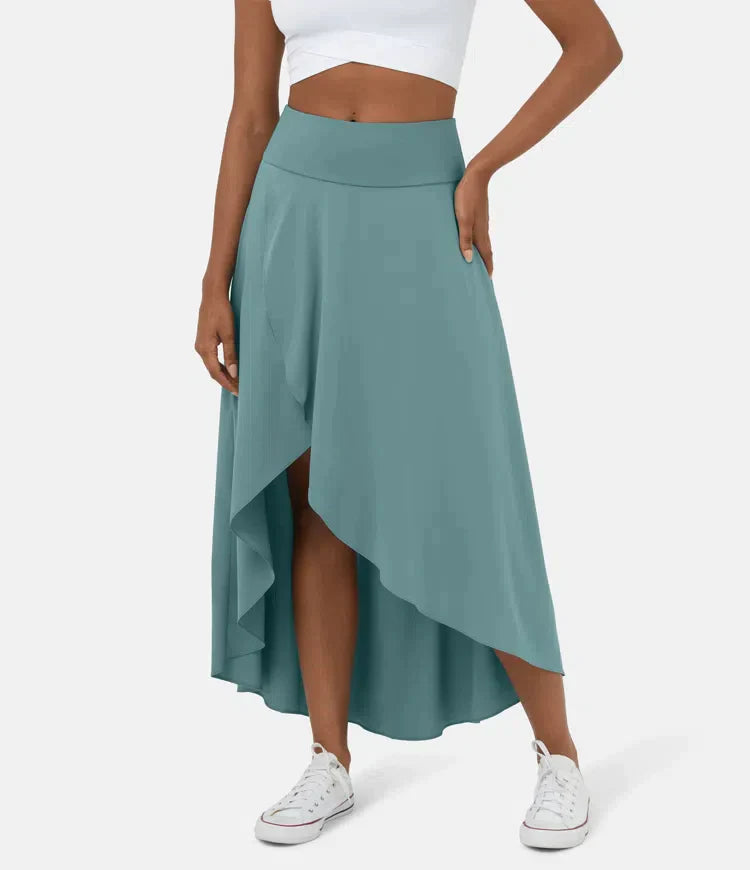 Asymmetric midi skirt in teal with high-low hem and draped side panel