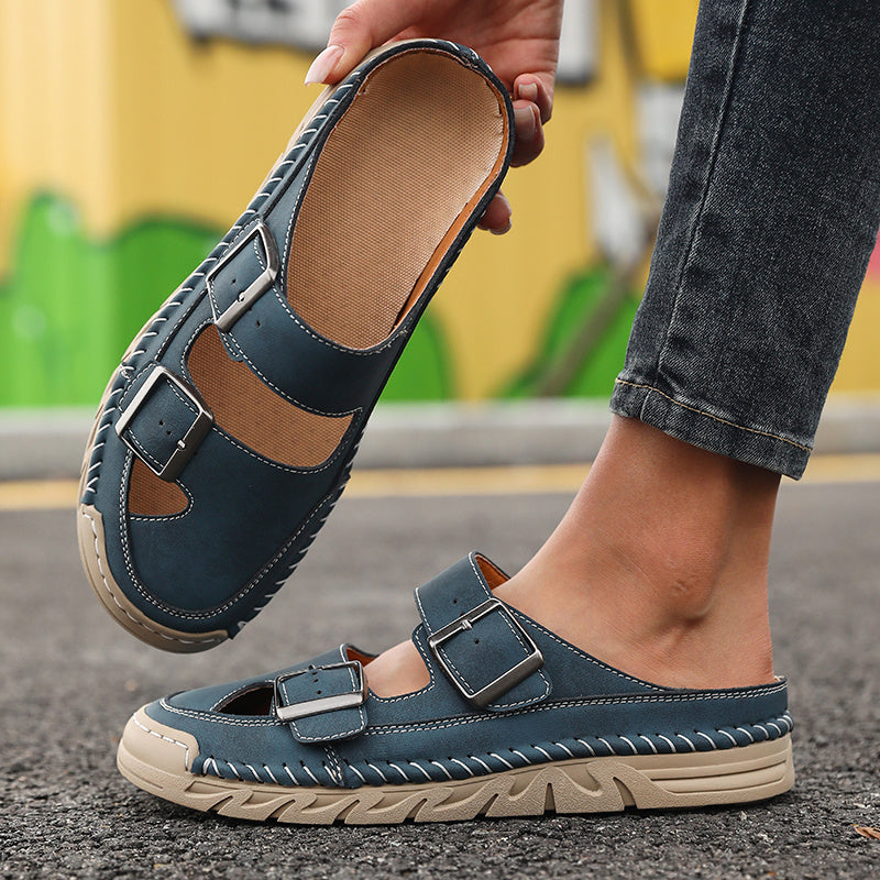 Sandali regolabili blu con doppia fibbia e suola beige zigrinata