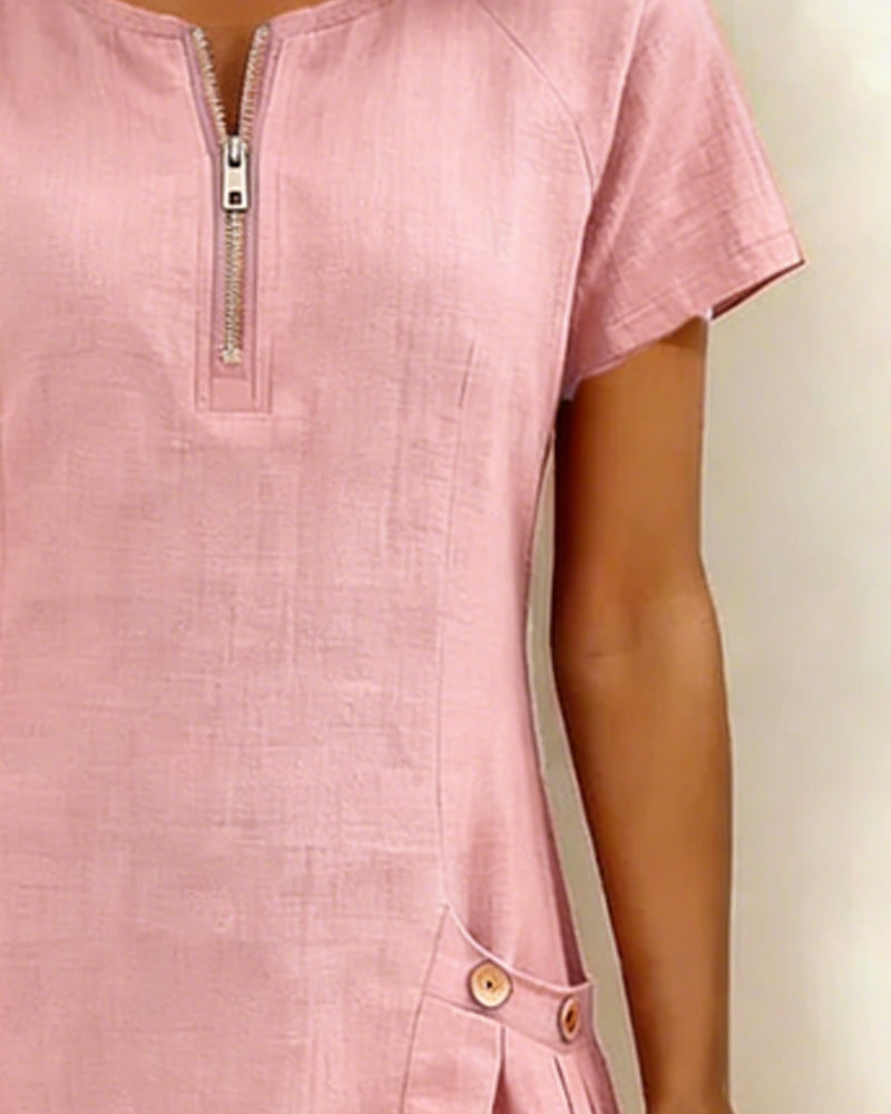 Abito in cotone rosa con zip centrale e tasca laterale con bottoni