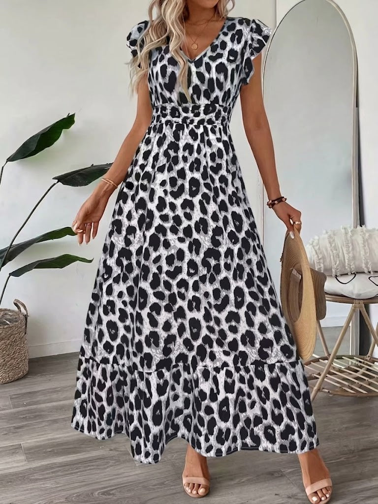 Maxi abito leopardo bianco e nero con scollo a V e maniche arricciate